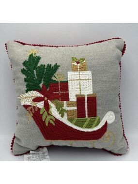 Embroidered Pillow Featuring Santa’s Sleigh and Christmas Gifts